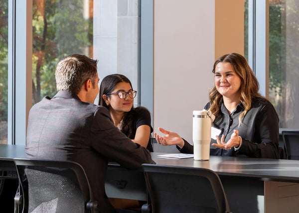 Students-talking-with-industry-reps-1400x1000-1